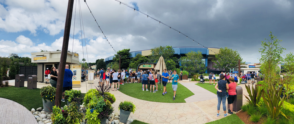 Little buildings selling food on a promenade in Future World Epcot