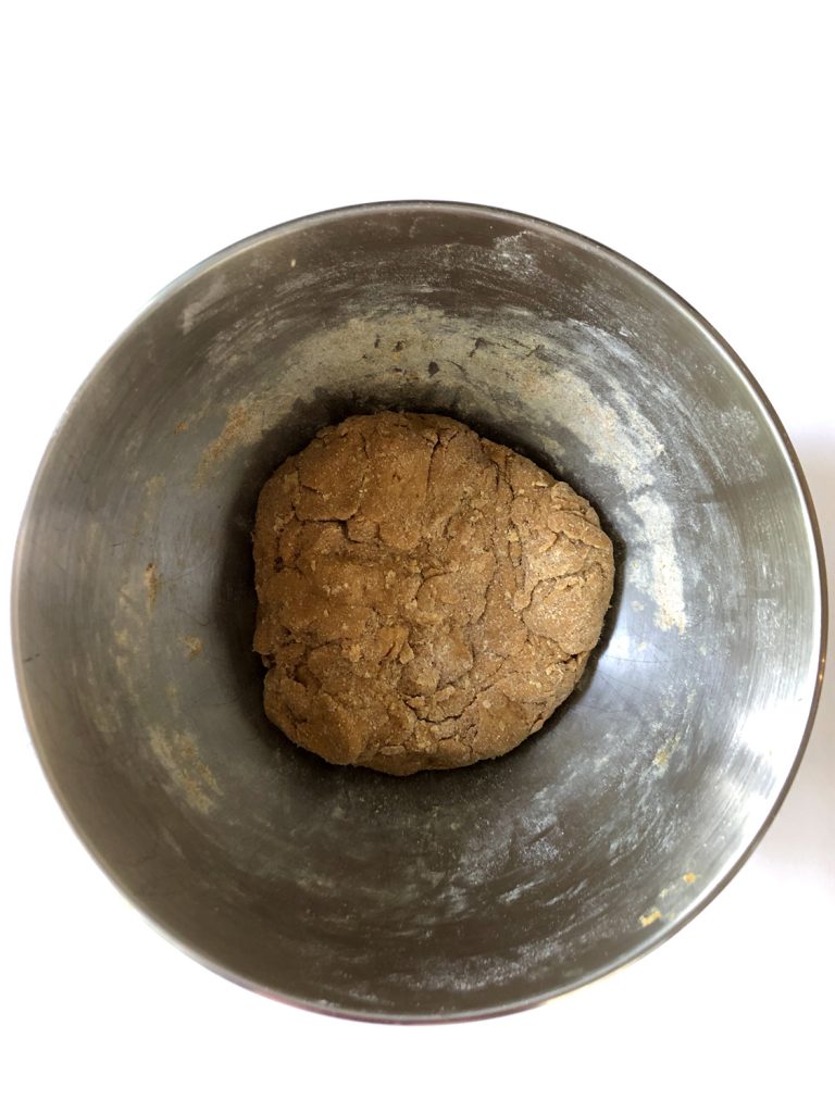 Homemade Peanut Butter Pumpkin Dog Treats Batter in a stainless steel bowl