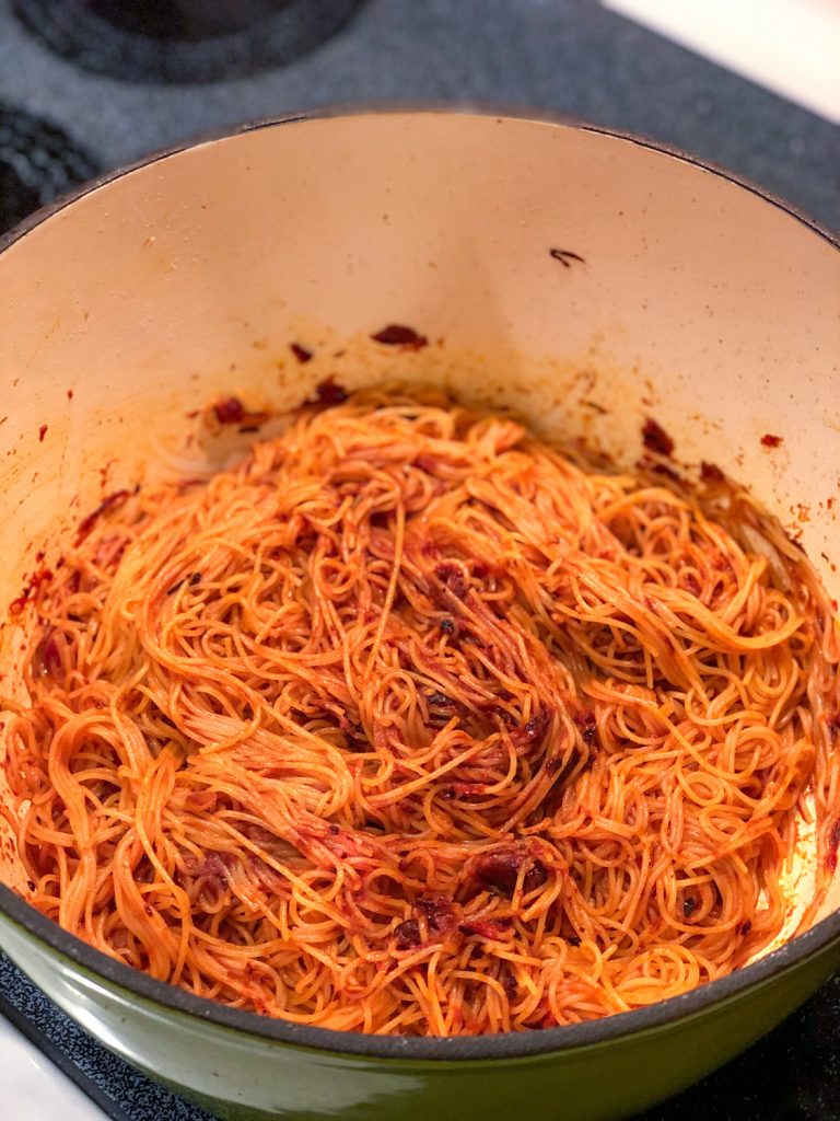 Green Pot with red pasta